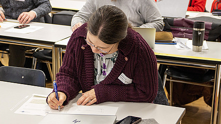 A participant working on one of the unplugged tasks